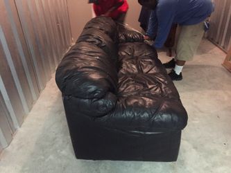 Black leather sofa good condition no holes in it