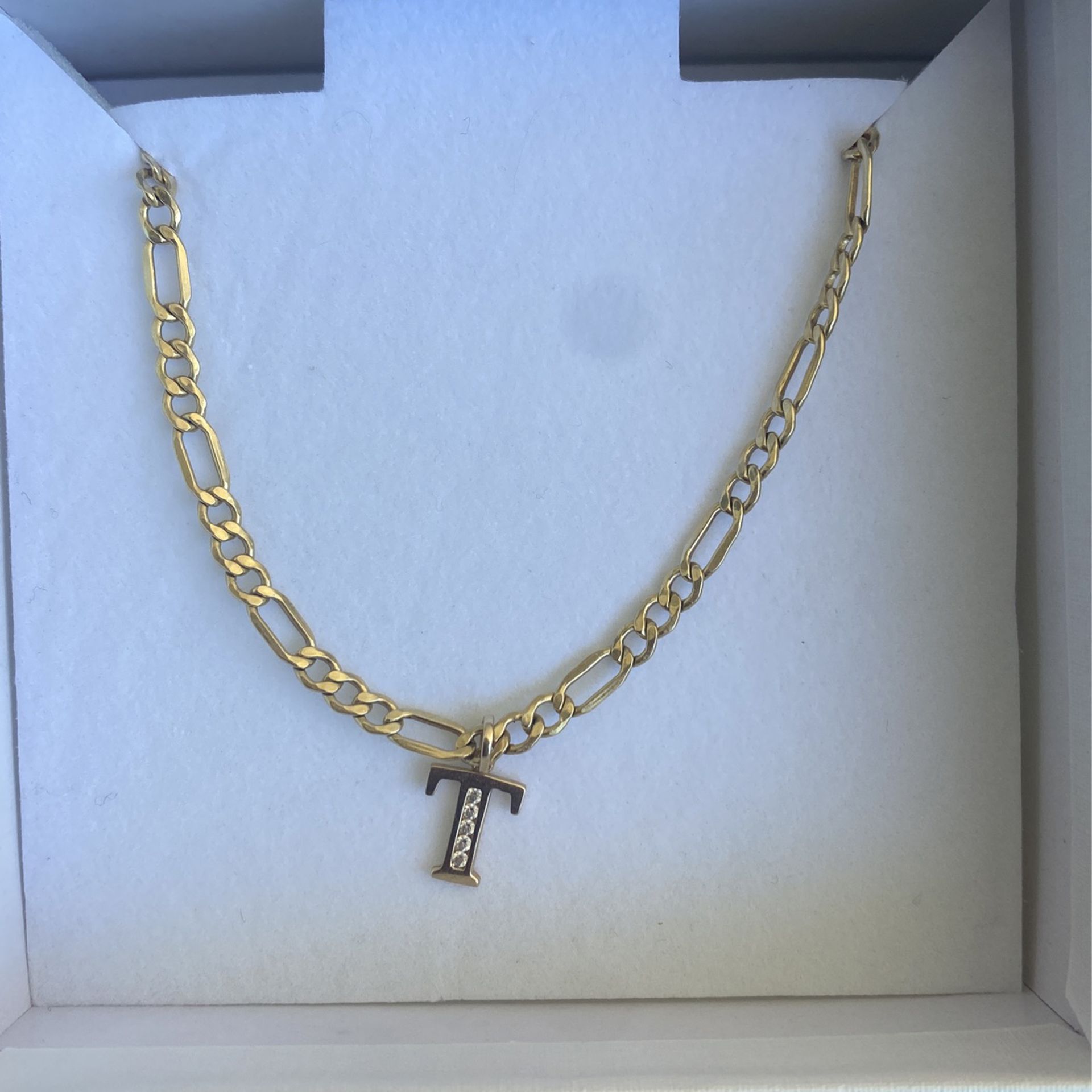 18' gold chain with t charm (optional) 