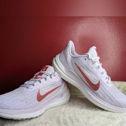 Nike Zoom Vomero 16 in white and red #running
