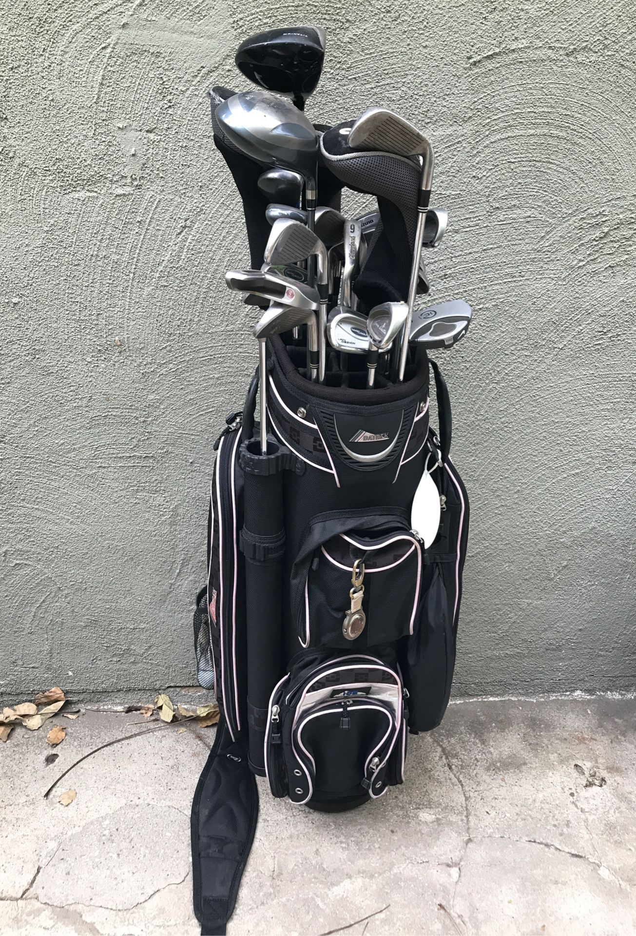 2 Sets of golf clubs