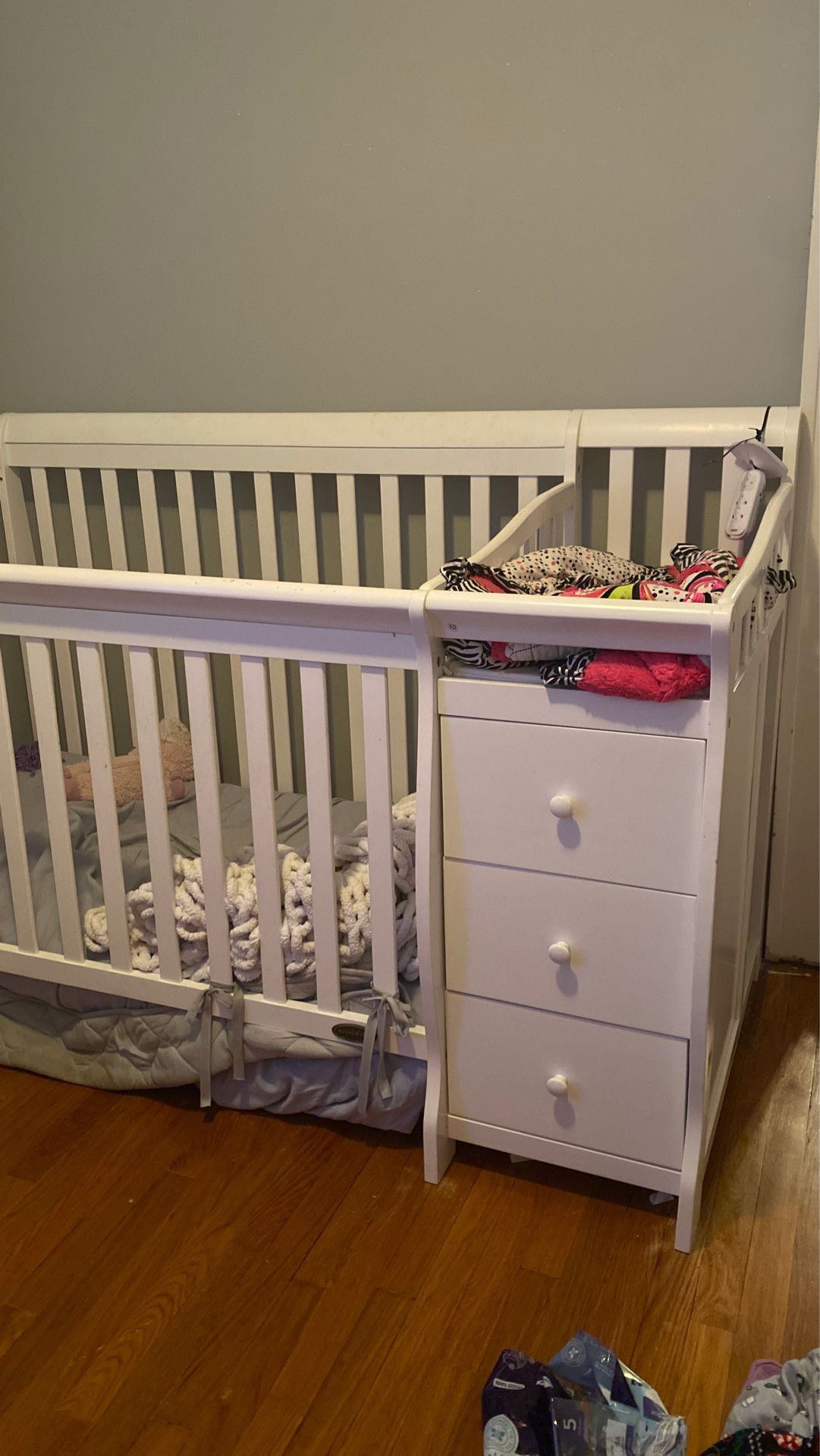 Crib and with changing table and storage