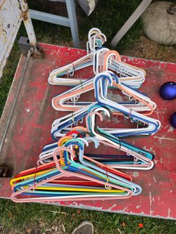 60 Assorted Plastic Coat Hangers