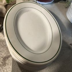 Six buffalo China oval plates