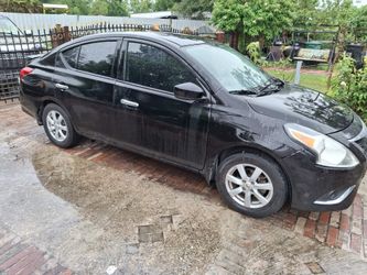 2015 Nissan versa SV sedan 4 doors