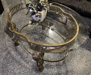 Large glass with gold rod, iron base, coffee table