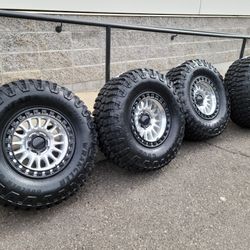 17" KMC rims w/ 35x12.50R17 Goodyear Boulder MT Tires