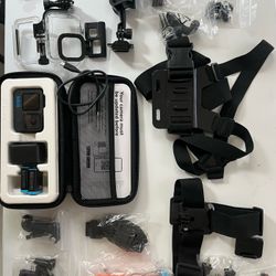 Go Pro + Accessories + 3 Extra Batteries + Hard Case