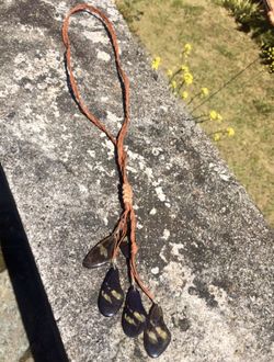 REAL butterfly wing necklace on braided leather