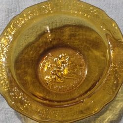 Amber glass child's bowl with nursery rhyme motif by Tiara Glass