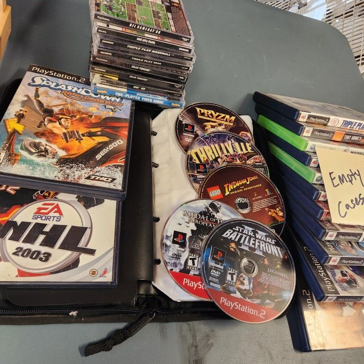 PS1 Games PS2 Games And Demo Discs Plus Empty Cases