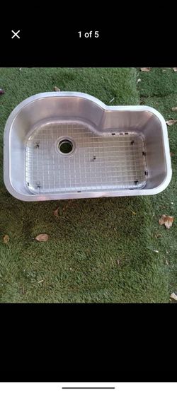 Stainless steel sink with insert