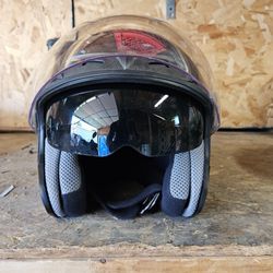 Motorcycle Helmet with drop down shades.