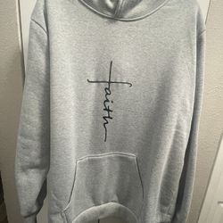Women’s Grey hoodie Says “Faith”