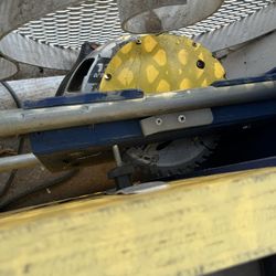 Yellow Blue And Silver Table Saw Tool