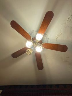 Brown wood fan
