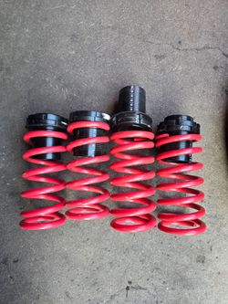Adjustable height springs