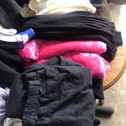Assorted winter clothing men women and children