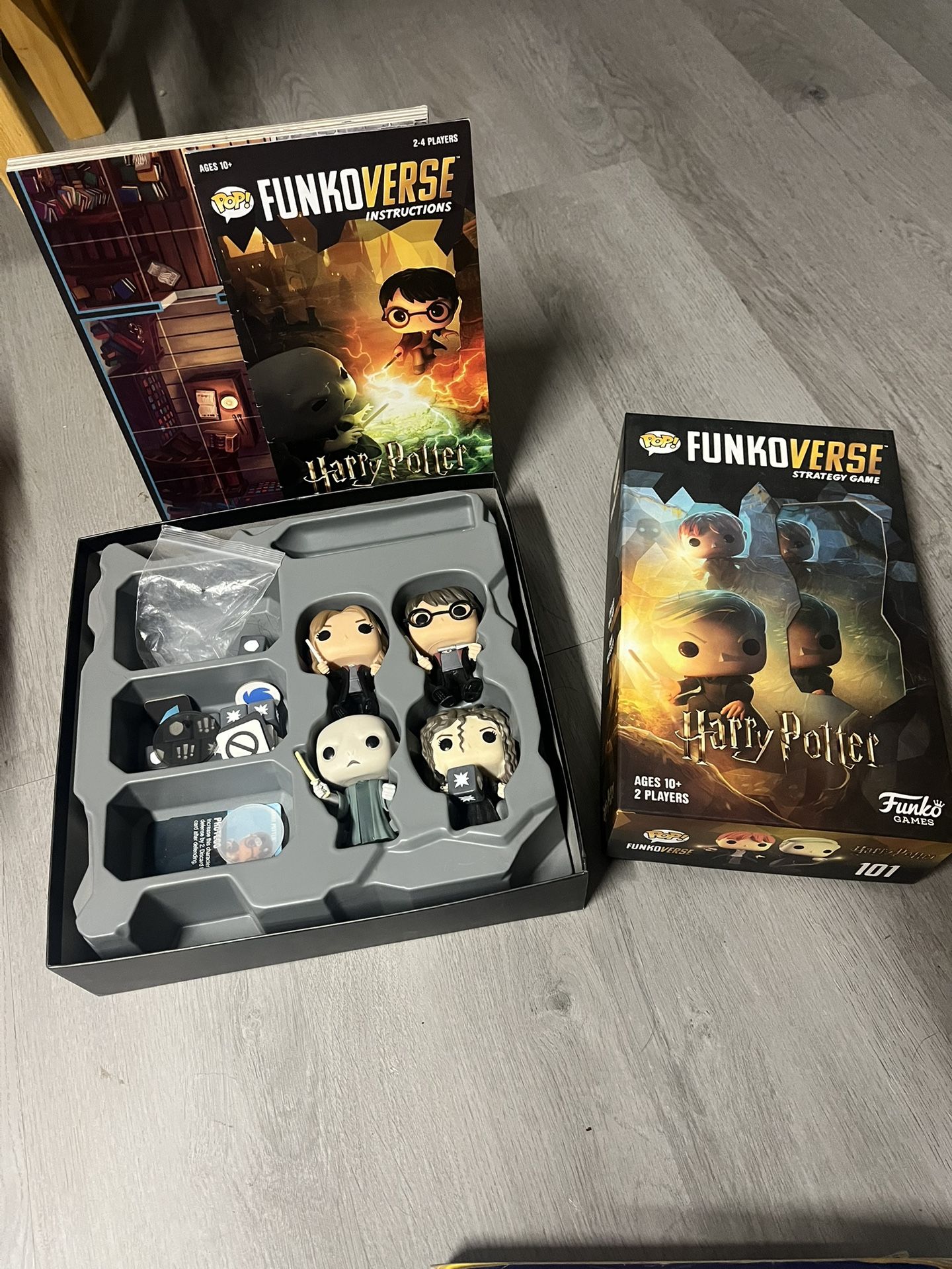 Two funko verse Harry Potter board games