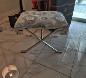 Patterned Upholstered Ottoman with Silver Metal Base
