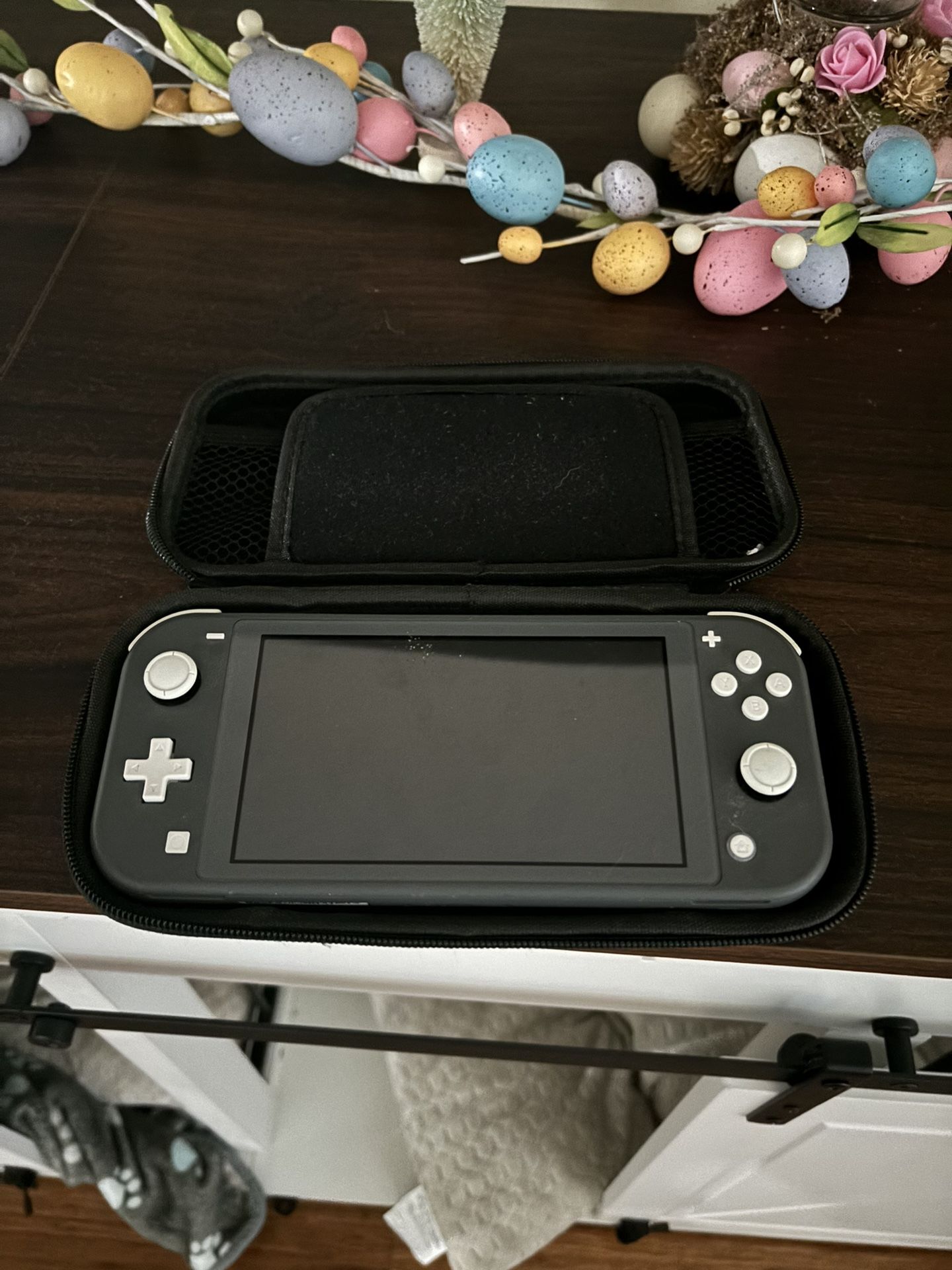 nintendo switch lite with botw and case