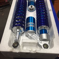 Aftermarket shocks for quad or motorcycle