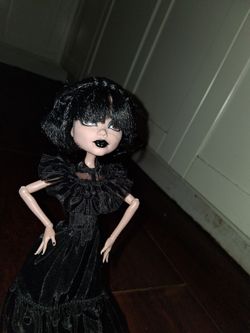 Wednesday Adam's doll