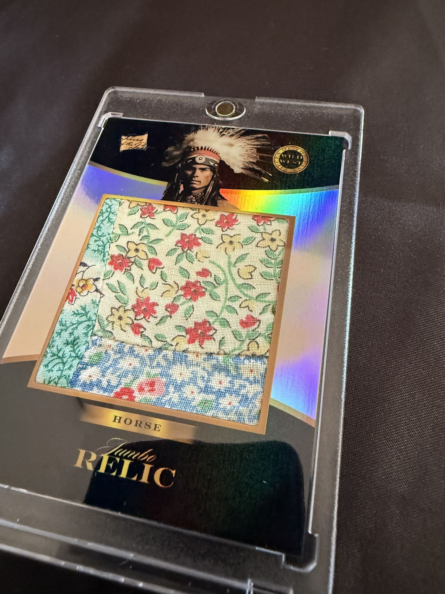 Pieces of the Past Wild West Edition Relic card featuring the Lakota war leader Crazy Horse. The small square of fabric in the center is an authentic