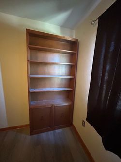 6 shelf book case made of cherry wood