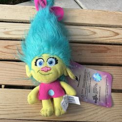 This is a DreamWorks Trolls Tiny Smidge Hug 'N Plush doll