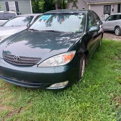 toyota camry 4 cylinders new wheels excellent paint air conditioning very good condition