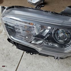 Toyota Tacoma left headlight lid oem