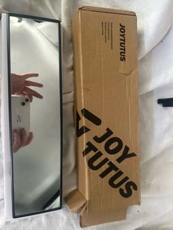 Joytutus universal 11.81-inch panoramic convex rearview mirror designed to reduce blind spots.