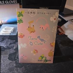 The Tera Cute Lens art board is a sealed non-TCG Blind Board