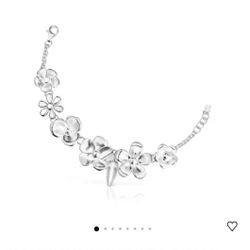 Set from Tous ( earing snd bracelet)