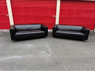 2 Black leather loveseats