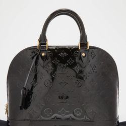 LOUIS VUITTON ALMA LEATHER HANDBAG