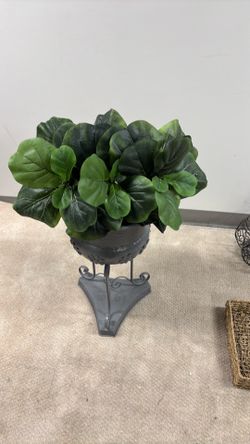 Metal planter for potted plants