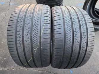2 USED TIRES PIRELLI 265/35/22