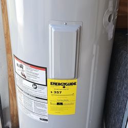 A.O. SMITH SIGNATURE ELECTRIC WATER HEATER......40 GALLON. ..NEW....$ 300