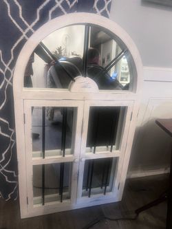 White arched mirror