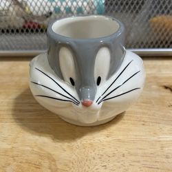 Selling this Unused Looney Tunes bugs bunny candle holder