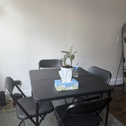 Table and four chairs