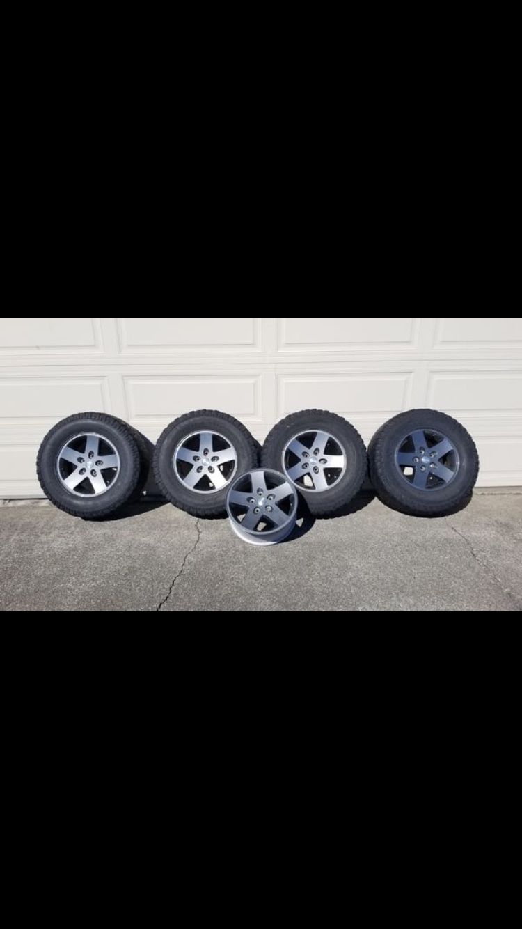 Stock Jeep wheels tires lugs