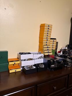 Designer wallets, colognes, and belts