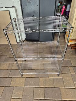 24" width X 14" depth X 30" height,  3 TIER STEEL WIRE SHELVING IN PERFECT CONDITION LIKE NEW  $25
