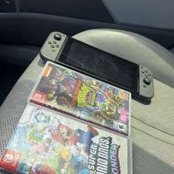 Nintendo switch and two games