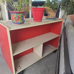 Red Shelve$100-,Picnic Table $10, And Grey Large Chais With Ottoman. $125-