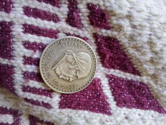 14g of silver peso coin