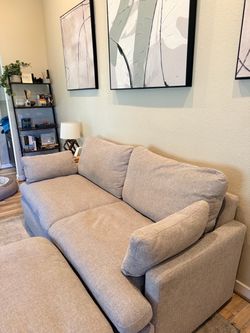 Living Spaces gray sofa w/ ottoman