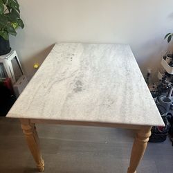Anthropologie marble dining table $1000